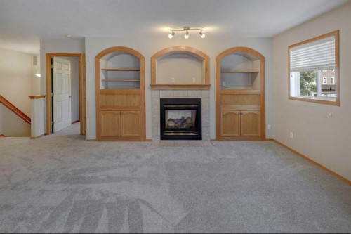 6711 Pinecliff Grove Ne, Calgary, AB - Indoor Photo Showing Other Room With Fireplace