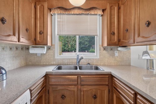 224 Silver Crest Drive Nw, Calgary, AB - Indoor Photo Showing Kitchen With Double Sink