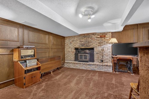 224 Silver Crest Drive Nw, Calgary, AB - Indoor With Fireplace