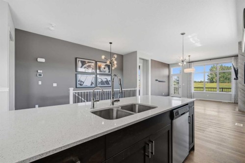 240 D'Arcy Ranch Drive, Okotoks, AB - Indoor Photo Showing Kitchen With Double Sink