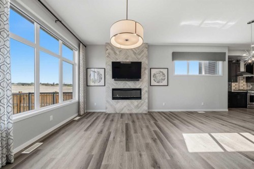 240 D'Arcy Ranch Drive, Okotoks, AB - Indoor Photo Showing Living Room With Fireplace