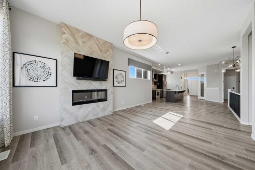 240 D'Arcy Ranch Drive, Okotoks, AB - Indoor Photo Showing Living Room With Fireplace