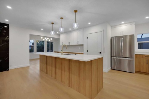 3331 41 Street Se, Calgary, AB - Indoor Photo Showing Kitchen With Double Sink