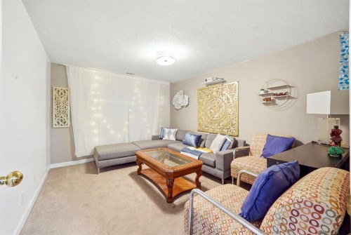 721 27 Avenue Nw, Calgary, AB - Indoor Photo Showing Living Room