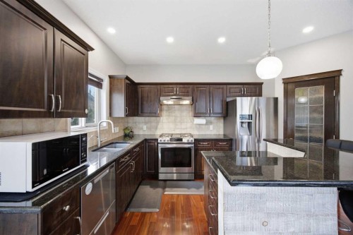 336 Silverado Drive Sw, Calgary, AB - Indoor Photo Showing Kitchen With Stainless Steel Kitchen With Double Sink With Upgraded Kitchen