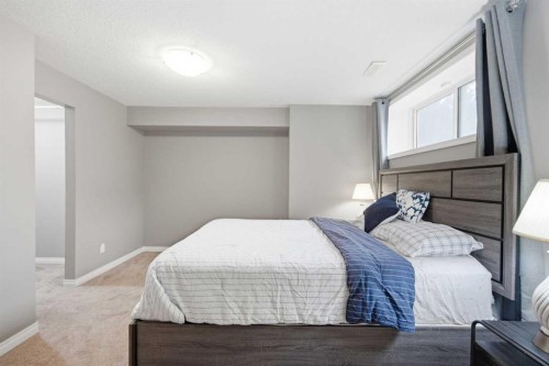 336 Silverado Drive Sw, Calgary, AB - Indoor Photo Showing Bedroom