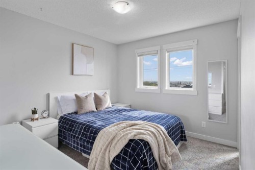 230 Covecreek Circle Ne, Calgary, AB - Indoor Photo Showing Bedroom