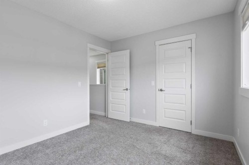 230 Covecreek Circle Ne, Calgary, AB - Indoor Photo Showing Other Room