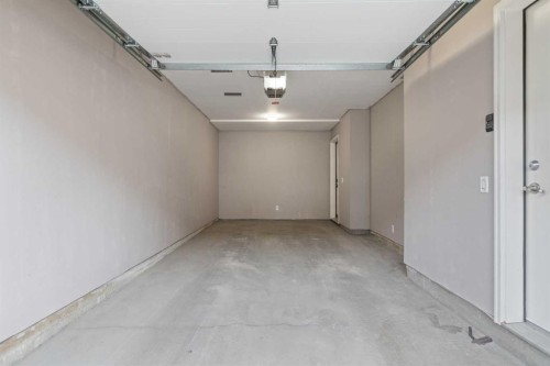 230 Covecreek Circle Ne, Calgary, AB - Indoor Photo Showing Garage