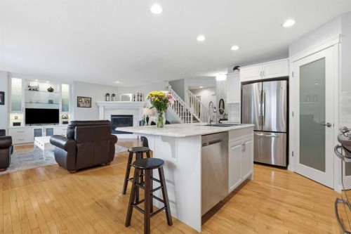 182 Kincora Park Nw, Calgary, AB - Indoor Photo Showing Kitchen With Fireplace With Stainless Steel Kitchen With Upgraded Kitchen