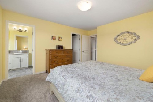 719 Mahogany Boulevard Se, Calgary, AB - Indoor Photo Showing Bedroom