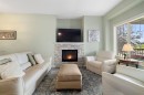 719 Mahogany Boulevard Se, Calgary, AB  - Indoor Photo Showing Living Room With Fireplace 