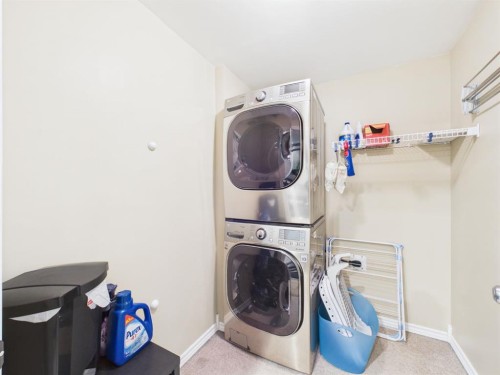 2049 New Brighton Gardens Se, Calgary, AB - Indoor Photo Showing Laundry Room