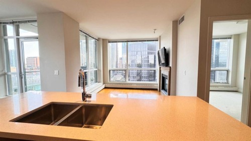 1615-222 Riverfront Avenue Sw, Calgary, AB - Indoor Photo Showing Kitchen With Double Sink