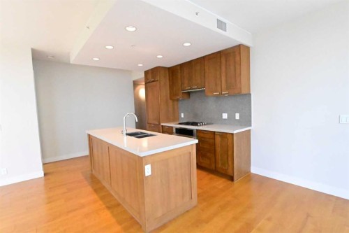 1615-222 Riverfront Avenue Sw, Calgary, AB - Indoor Photo Showing Kitchen With Double Sink