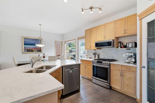 54 Rockyledge Rise Nw, Calgary, AB - Indoor Photo Showing Kitchen With Stainless Steel Kitchen With Double Sink