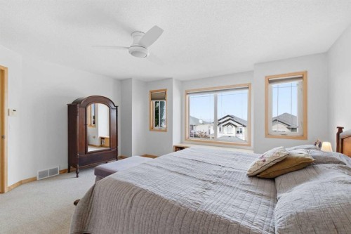 54 Rockyledge Rise Nw, Calgary, AB - Indoor Photo Showing Bedroom