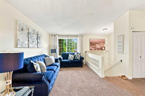 225 Harvest Glen Place Ne, Calgary, AB - Indoor Photo Showing Living Room