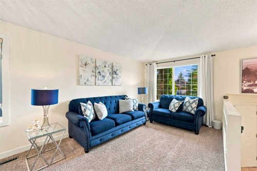 225 Harvest Glen Place Ne, Calgary, AB - Indoor Photo Showing Living Room