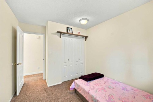 225 Harvest Glen Place Ne, Calgary, AB - Indoor Photo Showing Bedroom