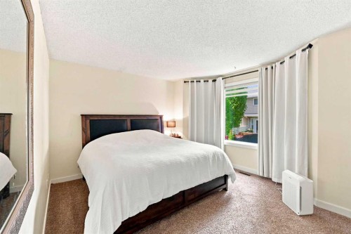 225 Harvest Glen Place Ne, Calgary, AB - Indoor Photo Showing Bedroom