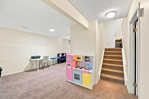 225 Harvest Glen Place Ne, Calgary, AB - Indoor Photo Showing Other Room
