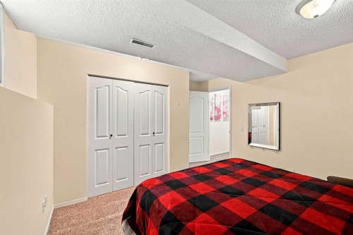 225 Harvest Glen Place Ne, Calgary, AB - Indoor Photo Showing Bedroom