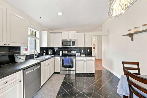 225 Harvest Glen Place Ne, Calgary, AB - Indoor Photo Showing Kitchen With Stainless Steel Kitchen