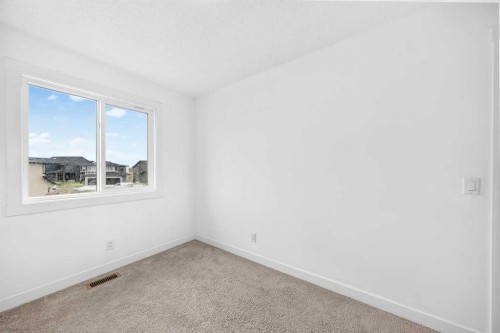 125 Herron Mews Ne, Calgary, AB - Indoor Photo Showing Other Room