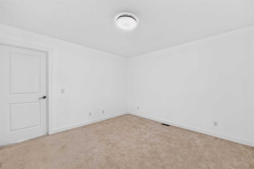125 Herron Mews Ne, Calgary, AB - Indoor Photo Showing Other Room