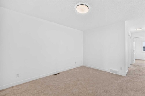 125 Herron Mews Ne, Calgary, AB - Indoor Photo Showing Other Room