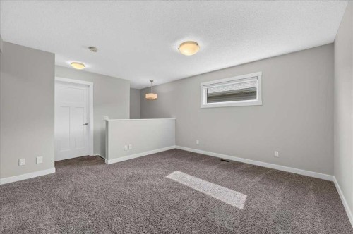97 Seton Manor Se, Calgary, AB - Indoor Photo Showing Other Room