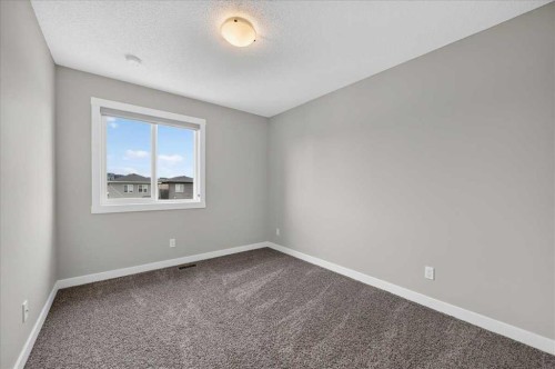 97 Seton Manor Se, Calgary, AB - Indoor Photo Showing Other Room