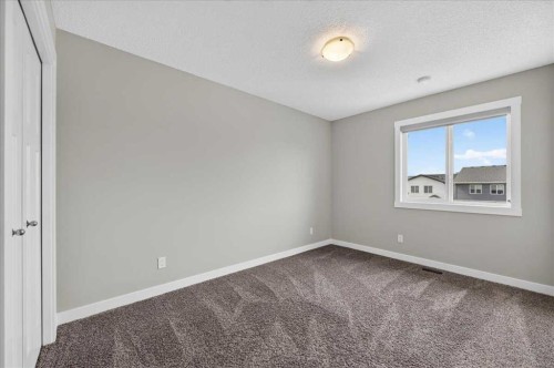 97 Seton Manor Se, Calgary, AB - Indoor Photo Showing Other Room