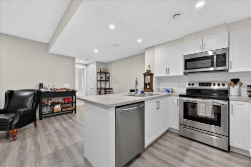 97 Seton Manor Se, Calgary, AB - Indoor Photo Showing Kitchen With Double Sink