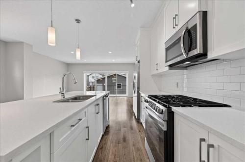 97 Seton Manor Se, Calgary, AB - Indoor Photo Showing Kitchen With Double Sink With Upgraded Kitchen