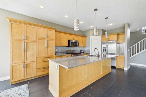 169 Brightonwoods Gardens Se, Calgary, AB - Indoor Photo Showing Kitchen With Upgraded Kitchen