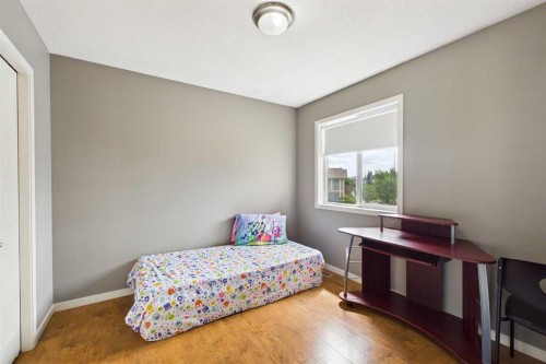 169 Brightonwoods Gardens Se, Calgary, AB - Indoor Photo Showing Bedroom
