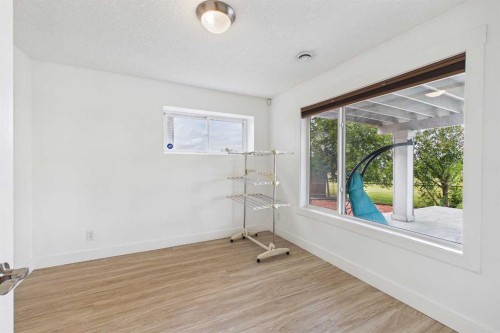 169 Brightonwoods Gardens Se, Calgary, AB - Indoor Photo Showing Other Room