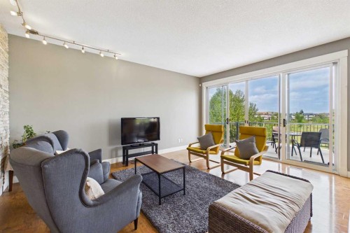 169 Brightonwoods Gardens Se, Calgary, AB - Indoor Photo Showing Living Room