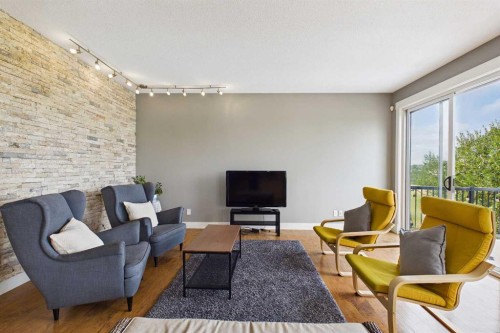 169 Brightonwoods Gardens Se, Calgary, AB - Indoor Photo Showing Living Room