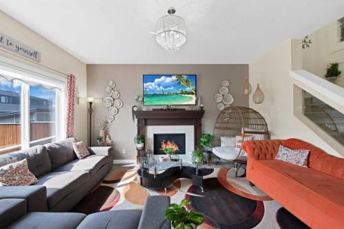 237 Cornerstone Manor Ne, Calgary, AB - Indoor Photo Showing Living Room With Fireplace