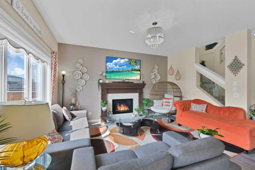 237 Cornerstone Manor Ne, Calgary, AB - Indoor Photo Showing Living Room With Fireplace