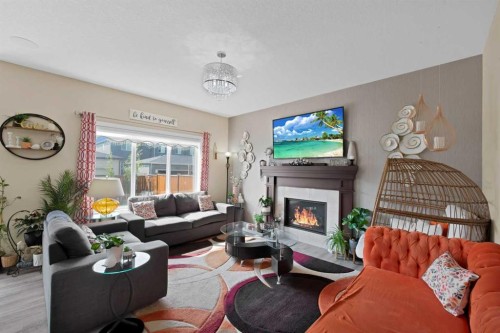 237 Cornerstone Manor Ne, Calgary, AB - Indoor Photo Showing Living Room With Fireplace
