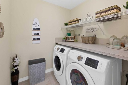 237 Cornerstone Manor Ne, Calgary, AB - Indoor Photo Showing Laundry Room