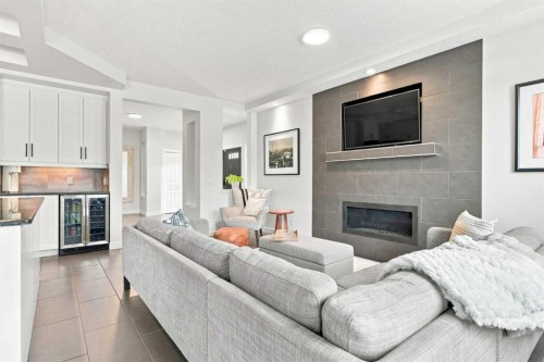 4 Silverado Saddle Court Sw, Calgary, AB - Indoor Photo Showing Living Room With Fireplace