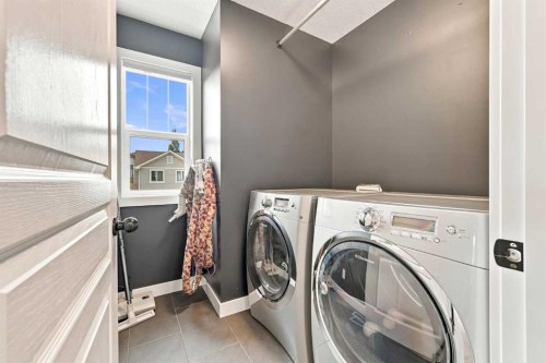 4 Silverado Saddle Court Sw, Calgary, AB - Indoor Photo Showing Laundry Room