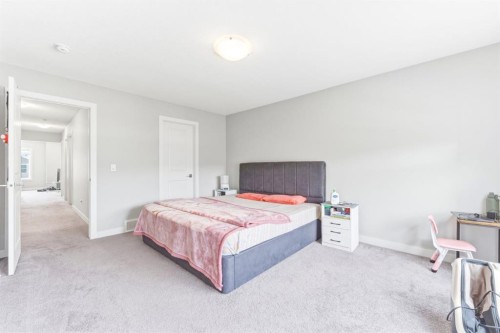 14 Belvedere Point Se, Calgary, AB - Indoor Photo Showing Bedroom