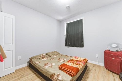 14 Belvedere Point Se, Calgary, AB - Indoor Photo Showing Bedroom