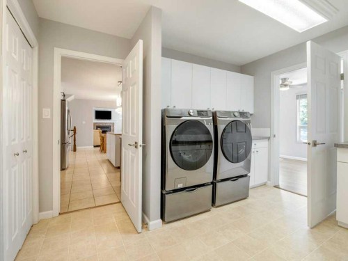 338 Deer Run Place West, Rural Lethbridge County, AB - Indoor Photo Showing Laundry Room